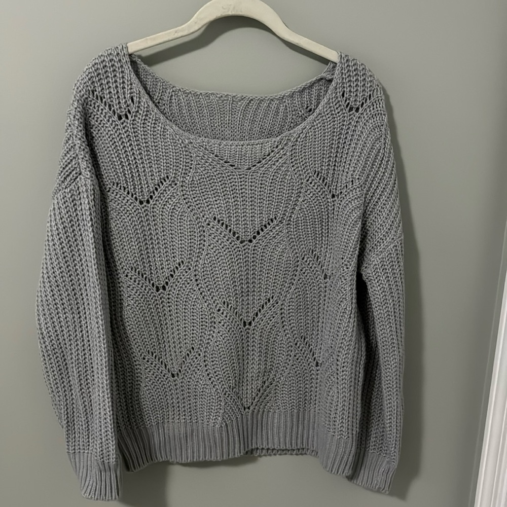 New, no tags. Soft gray sweater, size small. Wide neck.